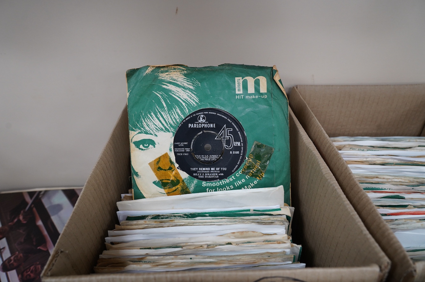 Three boxes of 7” singles on Parlophone and Pye labels, artists including; The Sweet, Orange Bicycle, the Beatles, Matt Monro, The Marcels, The Righteous Brothers, Chuck Berry, etc. Condition - fair